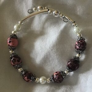 Expandable rose and clay bracelet